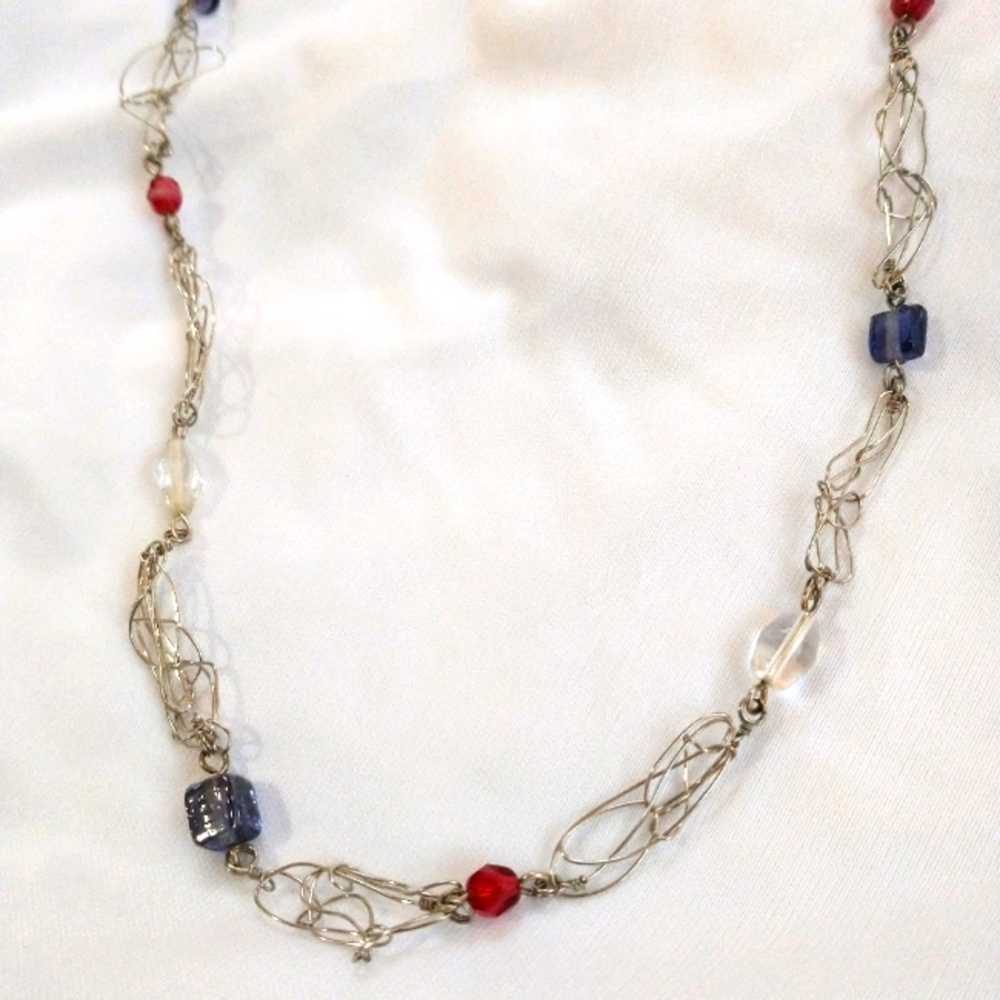 Woven silver necklace and earrings